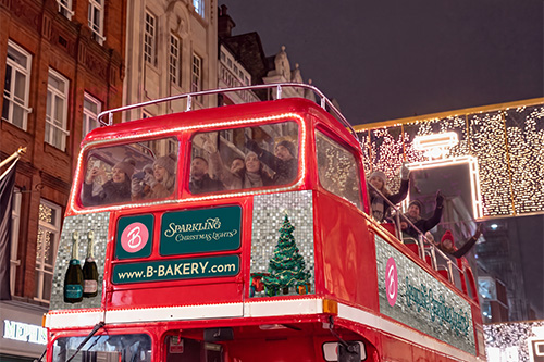 Cruise through Central London aboard Brigit's classic open-top Routemaster bus
